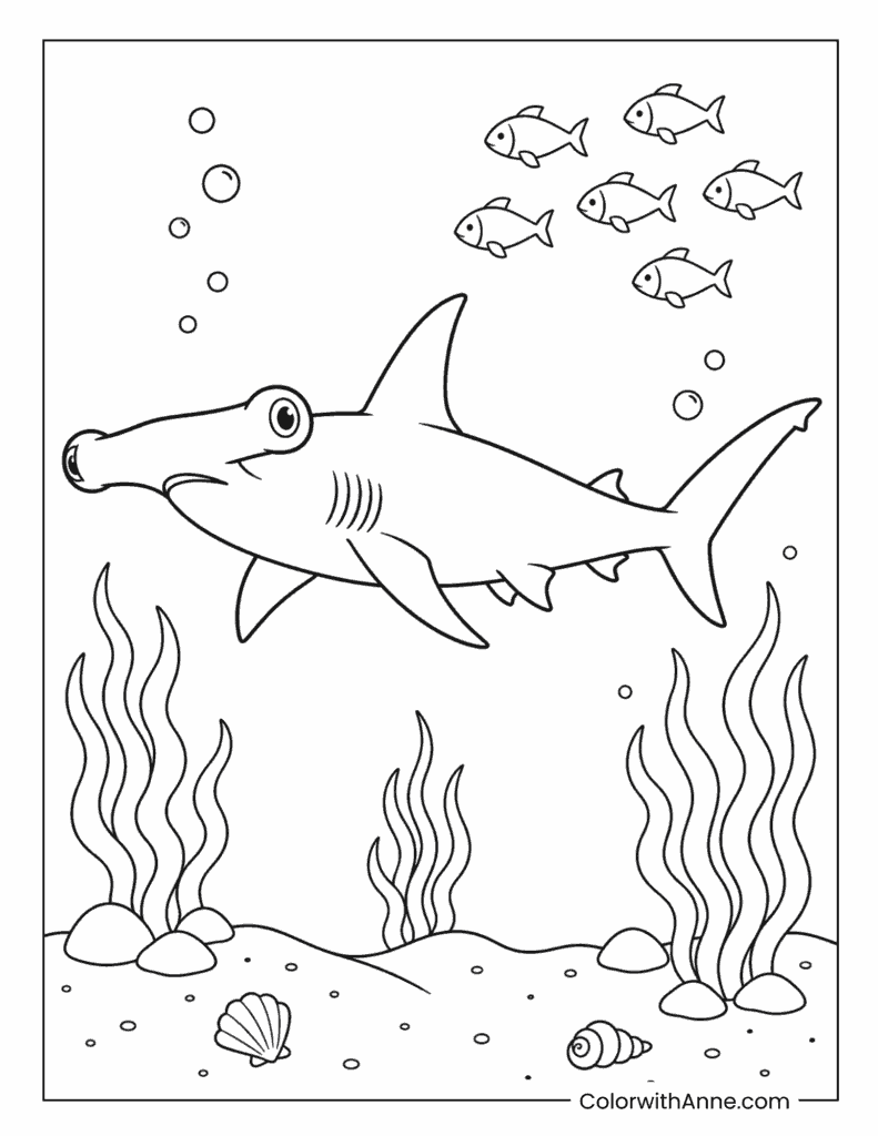 Hammerhead Shark Swimming with a School of Fish Coloring Page